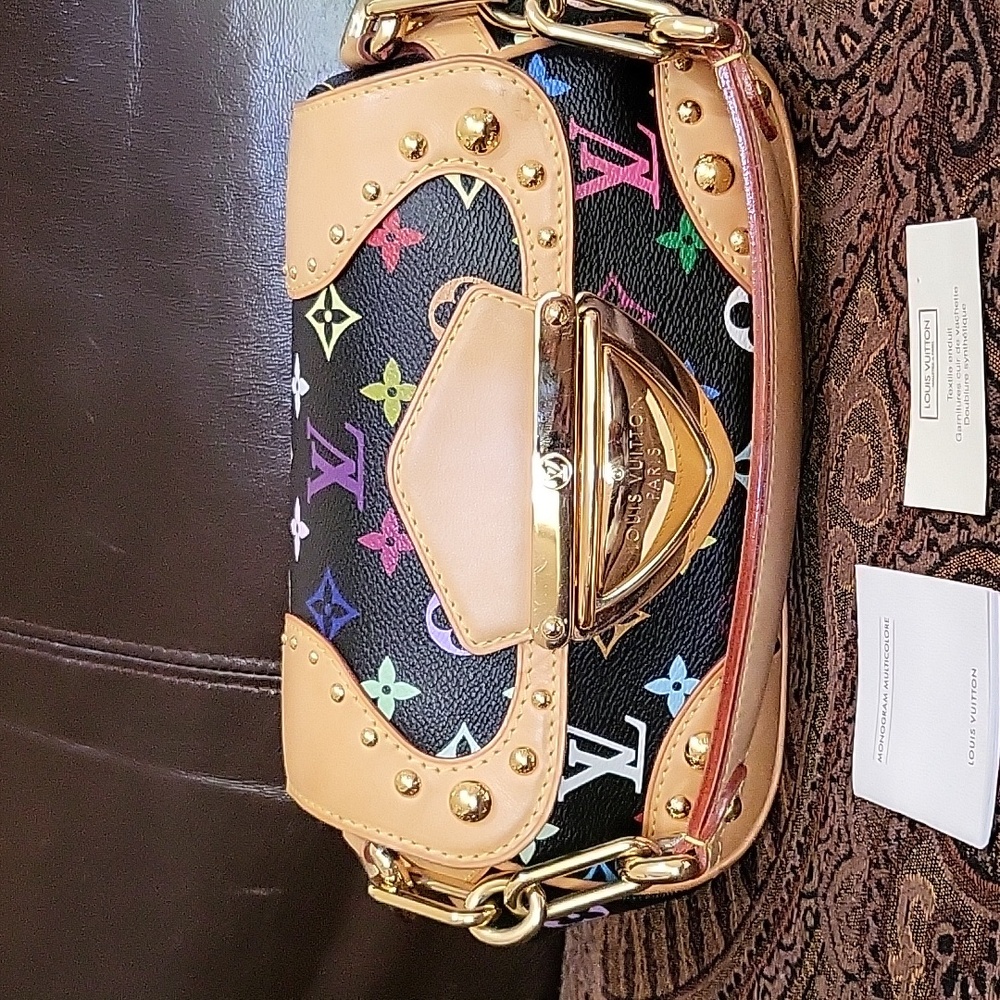 I am selling 100% authentic Louis Vuitton multiple color Marilyn mini bag.